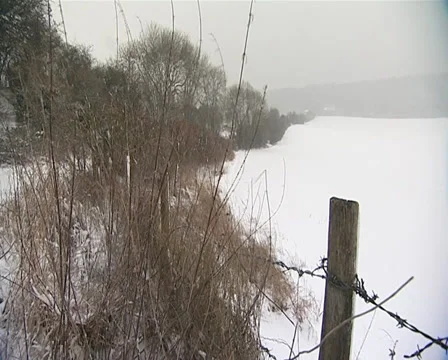 Fence in snow Stock Footage 32535600