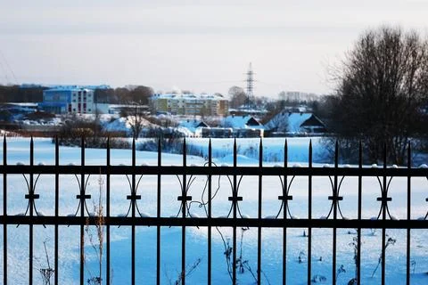 Fence with spikes sun Foto stock