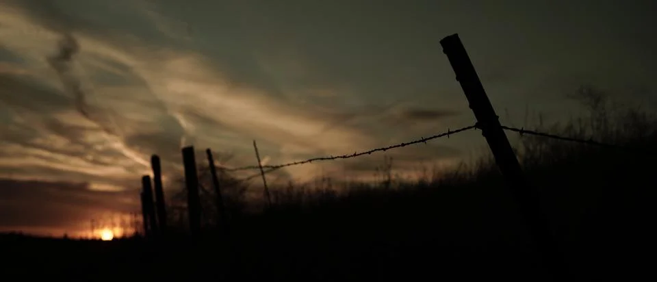 Fence at Sunset Stock Photos