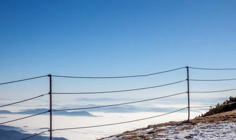 Fence on top ot the mountain Stock Photos