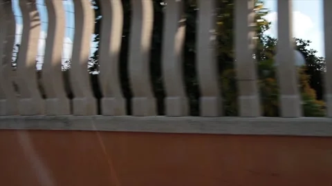 Fence villa beachside sicily italy daytime shot from moving driving vehicle Stock Footage 252151692