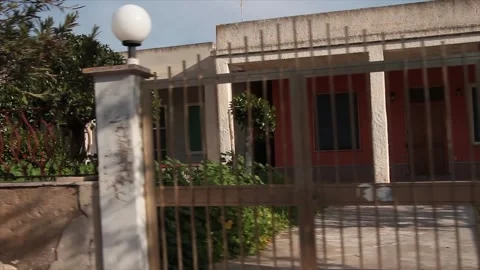 Fence villas beachside sicily italy daytime shot from moving driving vehicle Stock-Footage 252152964