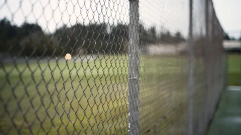 Fence walking shot - at slight angle Stock Footage 101453606