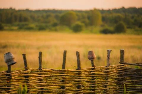 Fence wicker from the vine, texture, background. Wicker vine fence. woven vin Stock Photos