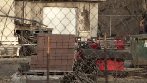 Fenced Off Abandoned Construction Site in Remote Rural Area Stock Footage 122412495