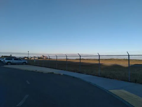A fenced airfield Foto stock