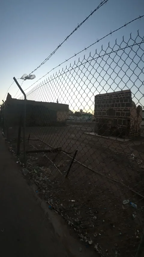 Fenced Ancient Stone Ruins at Twilight Stock Footage 346534473