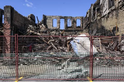 Fenced off destroyed building Stock Photos