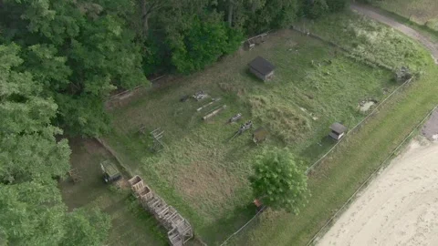 Fenced Pasture Enclosure Beside Dense Forest, Rural Farmland, Aerial Drone Shot Stock Footage 341324900