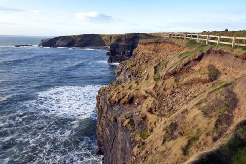 The fenced path along the cliff edge Stock Photos