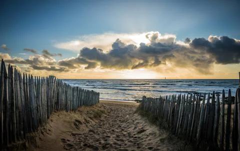 Fenced path to the beach Stock Photos