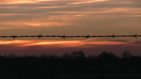Fenced in sunrise Video stock 47170674