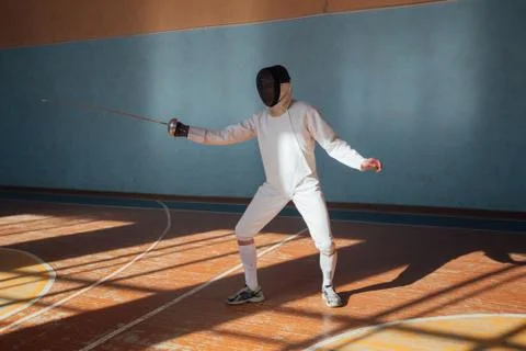 The fencer prepares for competitions. fencing coach. fencing sport motivation Stock Photos