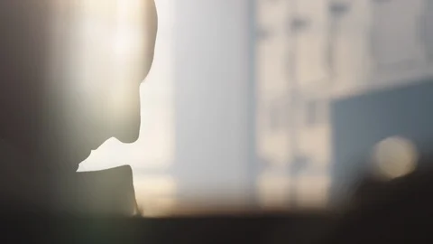 Fencer, silhouetted by a the sun through a window 스톡 동영상 109328677