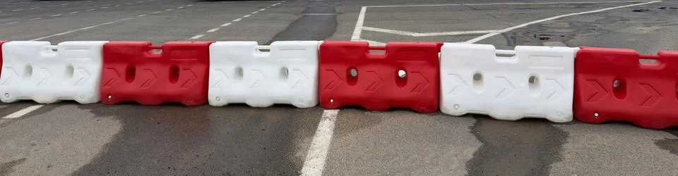 Fencing elements on the road. Stock Photos