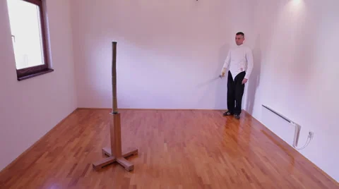 Fencing master practicing with sharp sabre Stock Footage 39610995