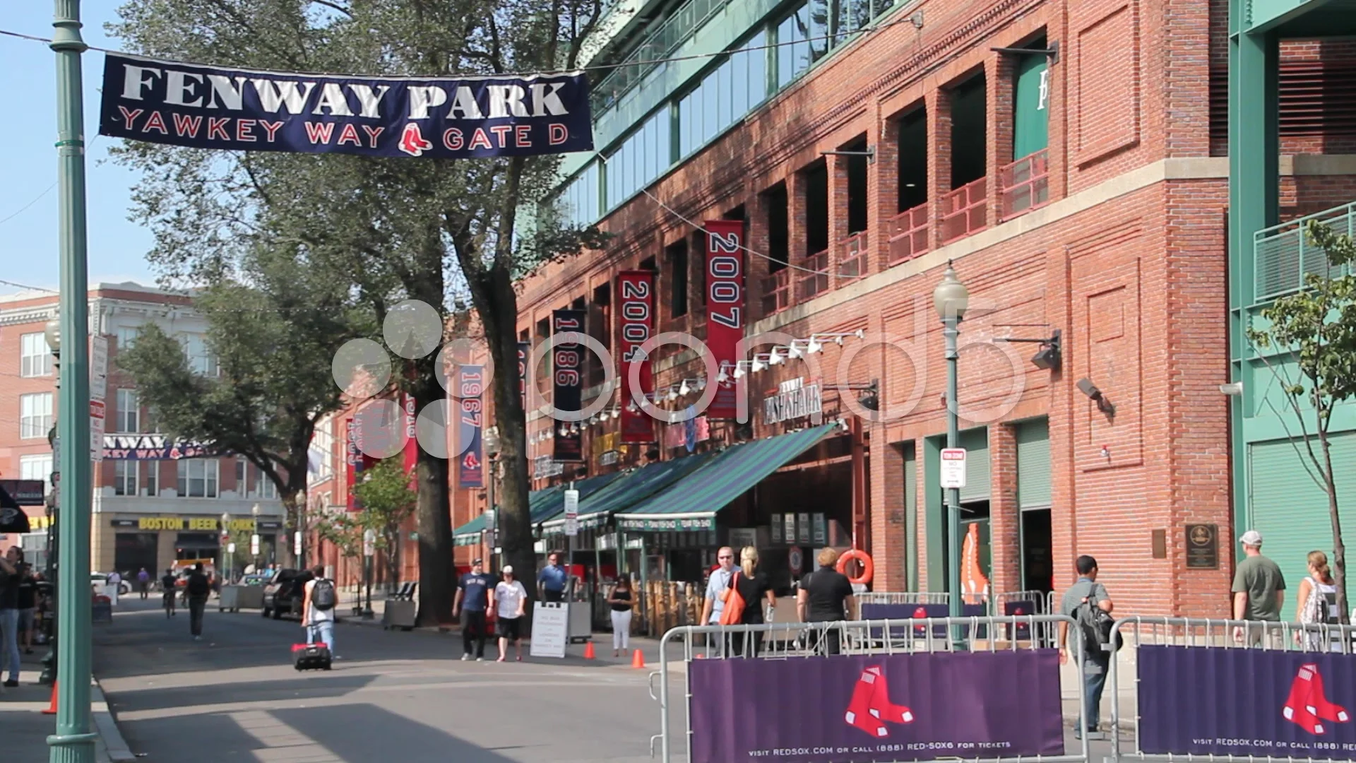 Fans gather on Yawkey Way at Fenway Park, Boston Red Sox Stock