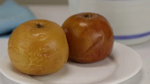 Fermented apples on a white plate Stock Footage 122063103