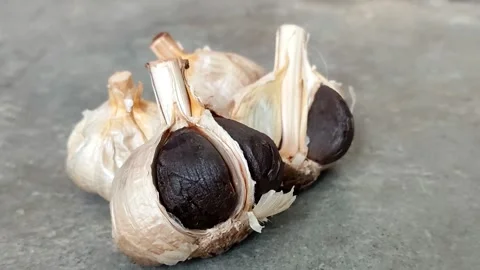 Fermented black garlic Stock Footage 341316790