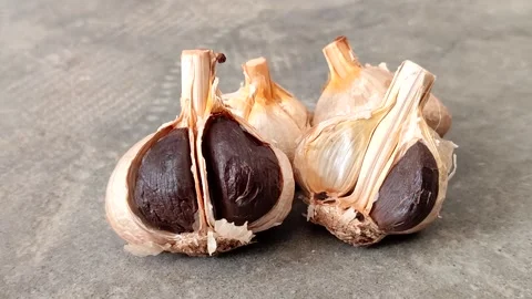 Fermented black garlic Stock Footage 341316802