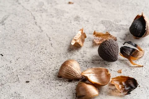 Fermented black garlic. Stock Photos