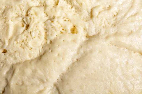 Fermented bread dough surface showing elastic texture with gas bubbles Stock Photos