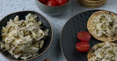 Fermented cabbage and fermented tomato pickles with roti corn breads. Stock Footage 279173924