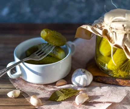 Fermented cucumbers on a dark background. Foto stock
