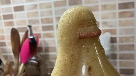 Fermented Molasses Foam Out from the bottle. Foam spilling out. Stock Footage 146726973