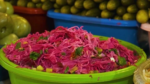 Fermented or salted red cabbage in food market. Pickled cabbage Stock Footage 226129981
