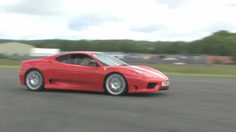 Ferrari 430 drive by Stock Footage 32492675
