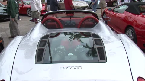 Ferrari engine under plexiglass tilt down Stock Footage 56786833