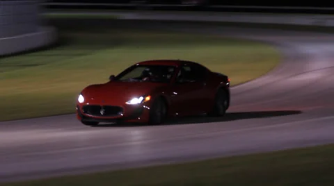 Ferrari on race track Stock Footage