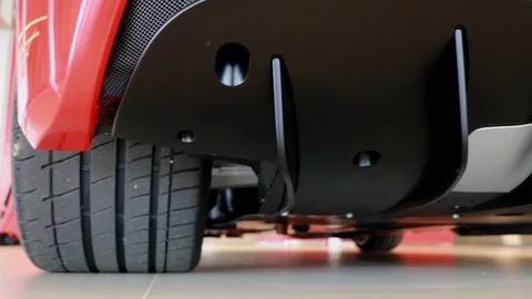 Ferrari Red underneath car Stock Footage 94427452