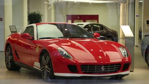 Ferrari in showroom window in Beijing Stock Footage 203177548