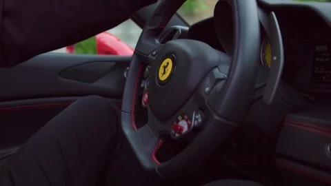 Ferrari Steering Wheel Closeup Stock Footage 111403086