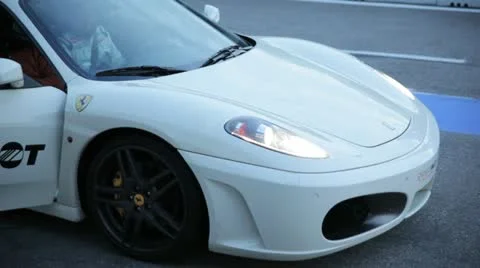 Ferrari in white with assistant driver Stock-Footage 20708755