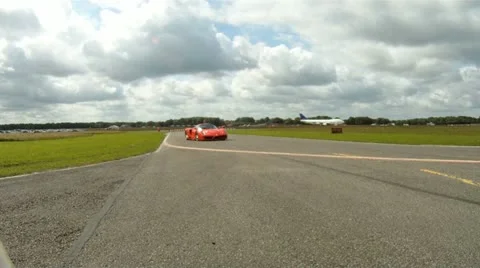 Ferrari's drive by Stock Footage 20541032