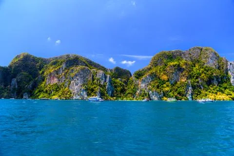 Ferries and rocks, Phi Phi Don island, Andaman sea, Krabi, Thail Stock Photos