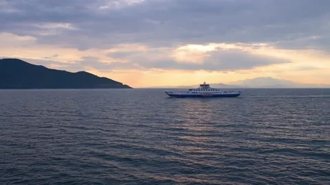Ferries are large boats designed to transport people, vehicles, and cargo across Stock Footage 239207475