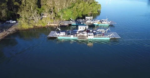 Ferries Crossing River Stock Footage 77054246