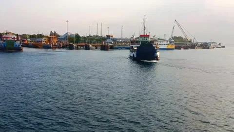 Ferries at the harbor with calm ocean waves Video stock 257691650