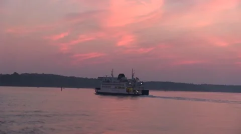 Ferries passing at sunset Stock Footage 41857438