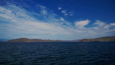 Ferries run between the mainland and the island Olkhon in Baikal. Ferry crossing Stock Footage 125465747