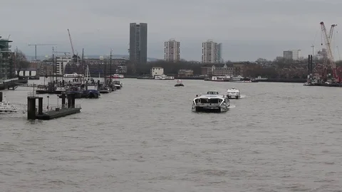 Ferries sailing down the River Thames London Stock-Footage 70619564
