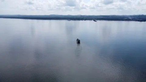 Ferries that take passengers to the port pass through the Kalimantan Sea Stock Footage 264796686