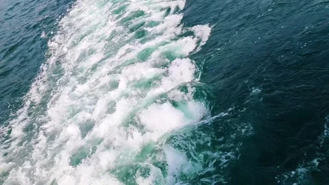 Ferries Wake Trail with Foamy White Water Splashes in Deep Blue Ocean Waves Stock Footage 345416304