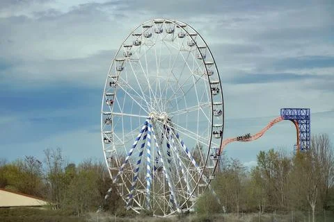 Ferris wheel against the background of clouds. 库存照片