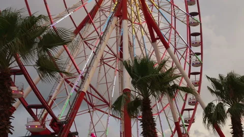 Ferris Wheel against the Blue Sky with Clouds Stock Footage 123711998