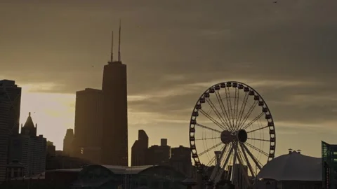 Ferris Wheel and Chicago Skyline at Suns... | Stock Video | Pond5